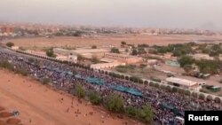 People protest near the defence ministry building in Khartoum, Sudan