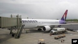 Hawaiian Airlines Flight 45 arrives from San Jose, Calif., in Kahului Airport in Kahului, Hawaii, on April 21, 2014.