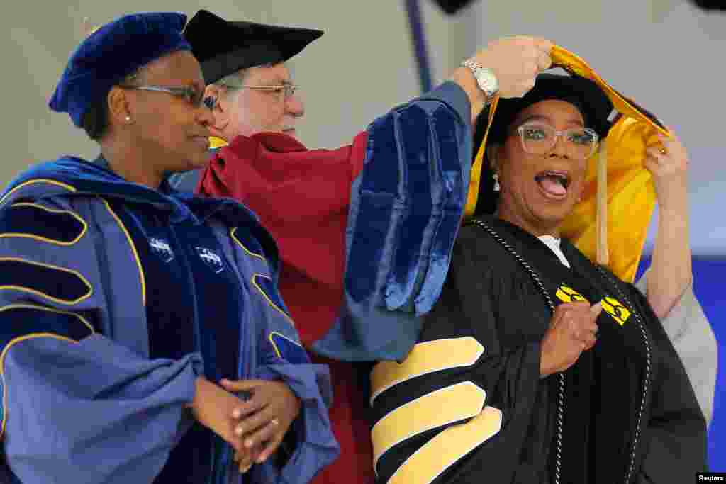 Entertainer Oprah Winfrey receives an honorary Doctor of Fine Arts degree during Commencement ceremonies at Smith College in Northampton, Massachusetts, May 21, 2017.