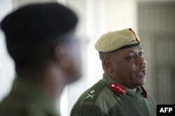 Lesotho's army Major General Lineo Poopa addresses the media at the Makoanyane Barracks in Maseru, on Sep. 1, 2014.