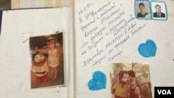 Family scrapbook entry: “To our dear and beloved granddaughter Masha on her Birthday for good memory from her grandmother and grandfather – The Shapovalovs. Be healthy and happy for the joy of your closest relatives." Courtesy: Butina family.