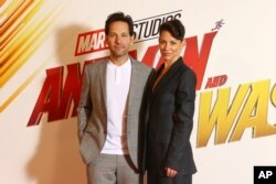 Los actores Paul Rudd y Evangeline Lilly posan para los fotógrafos al llegar a la sesión fotográfica de la película "Ant Man and The Wasp", en un hotel del centro de Londres, el martes 17 de julio de 2018.