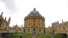 FILE - A man walks in front of Oxford University buildings, Oct. 6, 2020. Pakistan’s former prime minister Imran Khan has formally applied to run for chancellor of Oxford University.