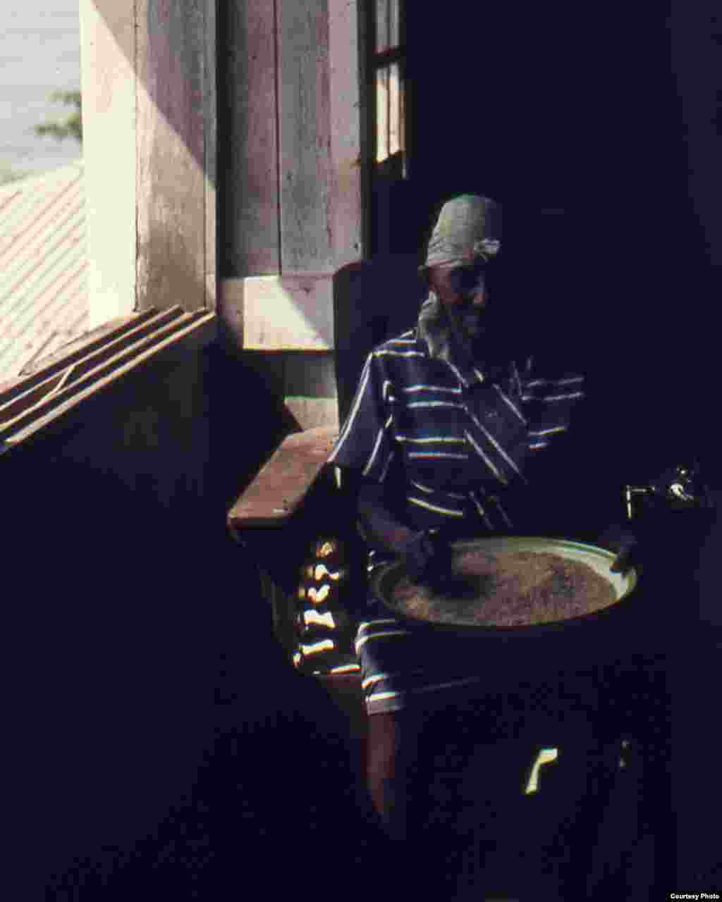 She&rsquo;s a neighbor who happened to be the granddaughter of a Liberian government official. Aunt Annie is picking small rocks out of rice. (Submitted by George Bergeman)