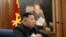 North Korean leader Kim Jong Un speaks during the Third Enlarged Meeting of the Seventh Central Military Commission of the Workers' Party of Korea in this undated photo released Dec. 22, 2019, by North Korea's Korean Central News Agency.