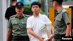 Former student leader Joshua Wong leaves prison after being jailed for his role in the Occupy Central movement, also known as "Umbrella Movement," in Hong Kong, June 17, 2019.