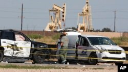 执法人员于在德克萨斯州敖德萨处理周六枪击案的犯罪现场。(2019年9月1日)
