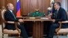 RUSSIA -- Russian President Vladimir Putin (L) meets with Ingushetia's leader Yunus-Bek Yevkurov in Moscow, July 9, 2018