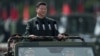 FILE - China's President Xi Jinping inspects People's Liberation Army soldiers at a barracks in Hong Kong, June 30, 2017.