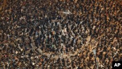 Thousands of protesters turn out outside government headquarters in Hong Kong, September 7, 2012, to protest against the government's plan to introduce a new subject "Moral and National Education" into a new curriculum. 