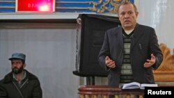 Sherkan Farnood, founder of Kabulbank, speaks in court in Kabul, March 5, 2013. 