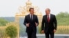 Macron, Putin Discuss Propaganda, Syria