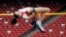 FILE - A security guard watches as a Russia athlete, front, makes an attempt at the women's high jump during the 2014 IAAF World Challenge Beijing held at China's National Stadium in Beijing, Wednesday, May 21, 2014. 