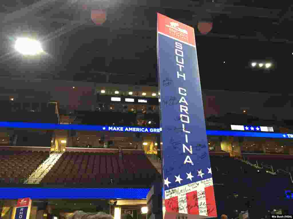 South Carolina delegates have written their names on the placard marking their section on the floor at the Republican National Convention, in Cleveland, July 21, 2016.
