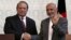Afghan President Ashraf Ghani (R) shakes hands with Pakistani Prime Minister Nawaz Sharif after a news conference in Kabul, May 12, 2015. 