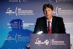 FILE - Arndt Freytag von Loringhoven, NATO’s first chief of intelligence and deputy head of Germany’s foreign intelligence agency, speaks at the World Summit on Counter-Terrorism, in Herzliya, Israel, Sept. 4, 2018.