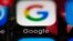 FILE- This April 26, 2017, file photo shows a Google icon on a mobile phone in Philadelphia. Google is spearheading an educational campaign to teach pre-teen children how to protect themselves from scams, predators and other trouble. The program announced Tuesday, June 6, is called “Be Internet Aware.” (AP Photo/Matt Rourke, File)