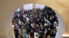 FILE - Devotees pray during the reopening ceremony of the St. Anthony's Shrine, one of the churches attacked in the April 21st Easter Sunday bombings in Colombo, Sri Lanka, June 12, 2019.