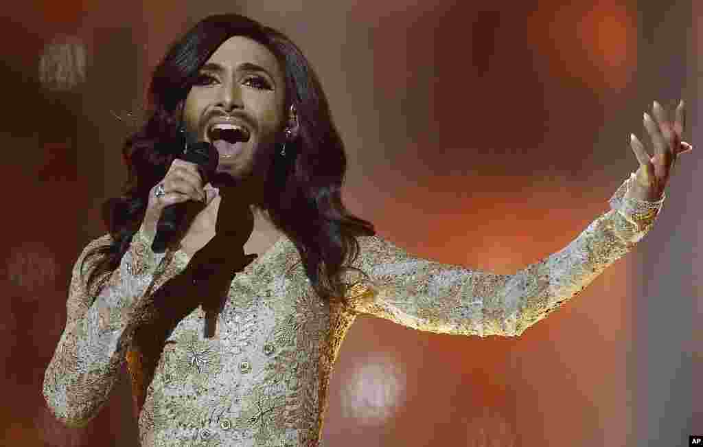 Singer Conchita Wurst representing Austria performs the song &#39; Rise Like a Phoenix&#39; during a rehearsal for the second semi-final of the Eurovision Song Contest in the B&amp;W Halls in Copenhagen, Denmark.