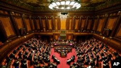 Italy's Prime Minister Mario Draghi addresses the Senate in Rome, Feb. 17, 2021, before submitting his government to a vote of confidence.