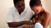 Nurse Koletha teaches Mwajuma how to breastfeed her one-day-old baby boy at the Lindi Regional Hospital, Tanzania. (Credit: Caroline Trutmann / Save the Children )