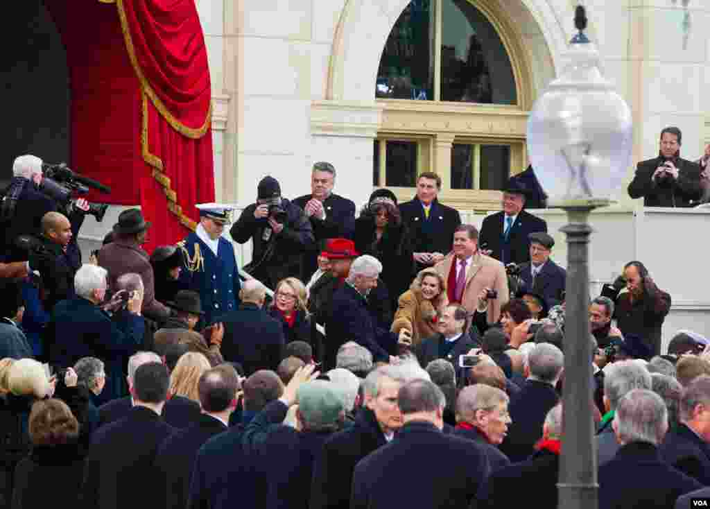 Bill and Hillary Clinton at the U.S. Capitol on Inauguration Day, January 21, 2013. (Alison Klein/VOA)