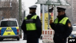 Полицейские на месте инцидента в Мюнхене, 14 февраля 2025 года (фото Michaela Stache/AFP)