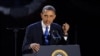 U.S. President Barack Obama, who won a second term in office by defeating Republican presidential nominee Mitt Romney, addresses supporters during his election night victory rally in Chicago, November 7, 2012.