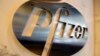 FILE - The Pfizer company logo is photographed at Pfizer Inc. headquarters, in New York, Dec. 4, 2017.
