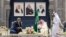 U.S. Secretary of State John Kerry, left, attends a coffee ceremony with Saudi Foreign Minister Prince Saud al-Faisal as a welcome upon Kerry's arrival in Jeddah, Saudi Arabia, June 25, 2013.