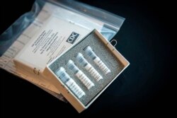 This undated photo provided by U.S. Centers for Disease Control and Prevention shows CDC’s laboratory test kit for the new coronavirus.