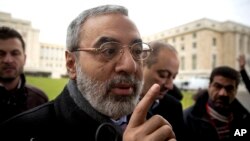 叙利亚新闻部长佐比在日内瓦介绍政府立场