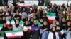 Iranian women sing their national anthem at Tehran’s Azadi Stadium just before the Iranian men’s national team kicked off against Bolivia in a friendly soccer match, Oct. 16, 2018. It was the first time in decades that an organized group of Iranian women had been allowed to attend such a match. (Soot360.ir)