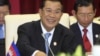 Cambodian Prime Minister Hun Sen spoke to the lower house of parliament in a nationally televised speech Thursday, Aug. 9, 2012, that was mandatory viewing for civil servants.