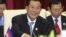 Cambodian Prime Minister Hun Sen spoke to the lower house of parliament in a nationally televised speech Thursday, Aug. 9, 2012, that was mandatory viewing for civil servants.