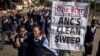 Schoolchildren walk past a newspaper placard reporting the election victory of Jacob Zuma's African National Congress (ANC) party, based on preliminary results, in the Soweto township of Johannesburg, South Africa, May 9, 2014.