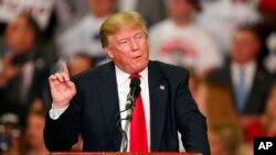 Republican presidential candidate Donald Trump speaks during a campaign rally in Madison, Miss., March 7, 2016.