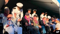 Retired U.S. Navy Cmdr. Don Long, left, and other Pearl Harbor survivors talk before a ceremony on the 78th anniversary of the Japanese attack on Pearl Harbor, Dec. 7, 2019, at Pearl Harbor, Hawaii. 