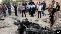 Serangan bom mobil di kawasan Syiah di Basra, Iraqk selatan hari Minggu (14/7).