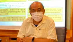 香港民意研究所副行政總裁鍾劍華，對4名年輕人因為參與六四燭光集會，而要受牢獄之災感到難過。(美國之音湯惠芸拍攝)