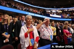 Delegates recite the Pledge of Allegiance as the last day of the Republican National Convention is opened, in Cleveland, July 21, 2016.