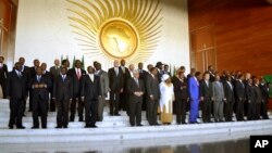 Heads of the African States pose for a group picture in Addis Ababa, Ethiopia, January, 27, 2013, during the African Union Conference. 