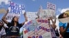 FILE - Supporters of the Deferred Action for Childhood Arrivals program demonstrate in front of the White House, Sept. 9, 2017.