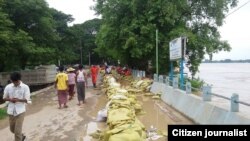 မုံရွာ စိုးရိမ်ရေမှတ်ကျော်နေတဲ့ အခြေအနေ။ (ဓာတ်ပုံ - မုံရွာမှာ ဘာတွေဖြစ်နေလဲ)