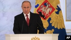 블라디미르 푸틴 러시아 대통령이 1일 모스크바 크렘린 궁에서 연례 국정 연설을 하고 있다.