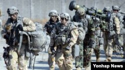 미한 양국 군이 지난달 연합부대를 편성해 북한의 핵·미사일 등 대량살상무기(WMD) 시설을 탐색하고 파괴하는 훈련을 최대규모로 진행한 것으로 확인됐다. 사진은 지난달 경기도 포천 영평사격장(로드리게스 훈련장)에서 열린 '태스크포스 아이언 레인저스'(Task Force Iron Rangers)라는 명칭의 연합부대가 북한 핵·미사일 시설 제거 훈련하는 모습. 