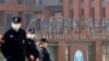 资料照片：中国武汉病毒研究所在世卫组织小组调查期间的安全防范措施。(2021年2月3日)