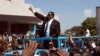Malawi celebrates its independence anniversary with speeches, parades, football, prayers and a new president, Peter Mutharika, who waved to crowds during his inauguration a month ago.