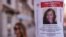 Pamflet sa likom Ana Marije Knežević Enao, nestale Amerikanke kolumbijskog porekla, na ulici u Madridu, 16. februara 2024. godine (Foto: AP/Manu Fernandez) 