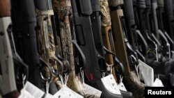 FILE PHOTO: Hunting rifles displayed for sale